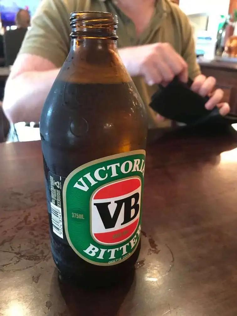 A Victoria Bitter on a pub table after landing in Australia